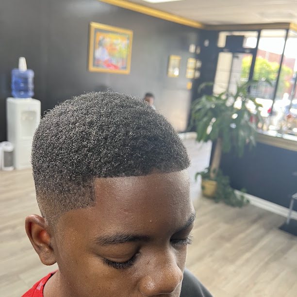 Clean kids’ haircut by Hondo